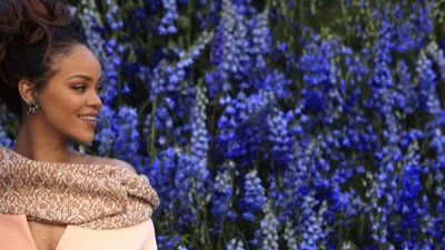 Rihanna pretty in pink at Paris Fashion Week Dior show