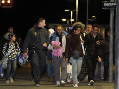 Denmark set to seize refugees' valuables after parliamentary approval