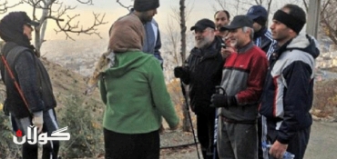 Rouhani swaps turban for baseball cap