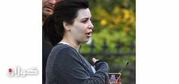 Pregnant Kim Kardashian eats breakfast on the run as she races to morning workout  with no make-up