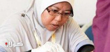 Malaysia ruling regime wins polls: election commission