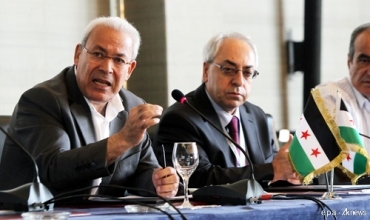 ENS: Qonaxa veguhastinê bê çûna Esed dest pê nake