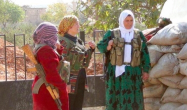 Dayîkek bûye şervan