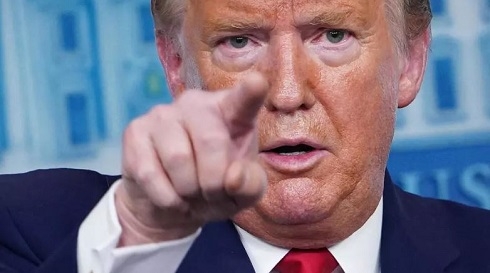 Trump warns Iran of 'heavy price' in case of attack on US troops