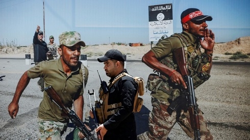 Militiamen killed in massive, multi-pronged ISIS attack in central Iraq