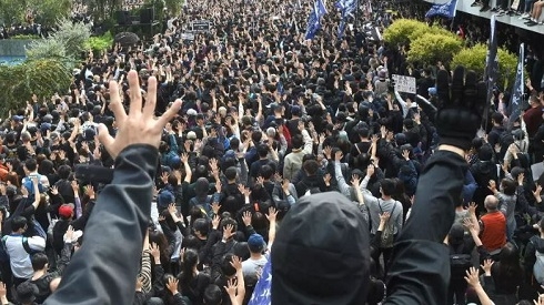 China warns Hong Kong protesters against 'stirring up trouble'