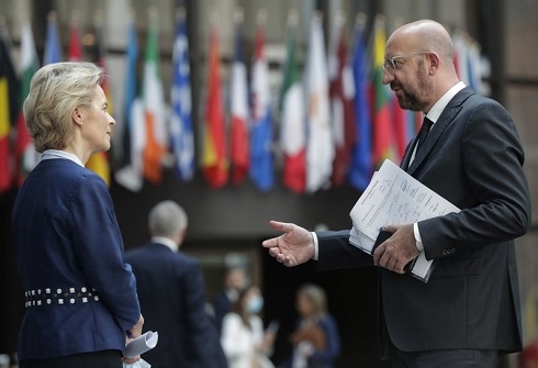 EU, China look to ease tensions, push on with business