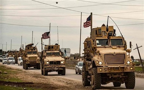 American convoy confronted and blocked by Syrian regime army unit in western Hasaka