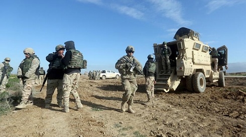 U.S.-led int'l coalition hands over military base to Iraqi forces