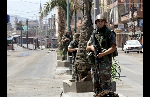 Three men killed in north Lebanon shooting, security sources say