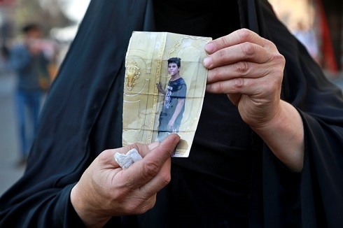 In Iraq a father faces militia power as he seeks missing son