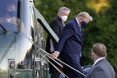 Trump, stricken by COVID-19, flown to military hospital