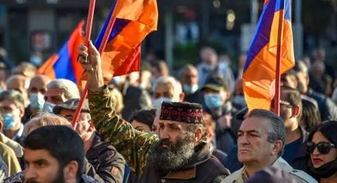 Armenian leader calls for halt to violence over peace deal