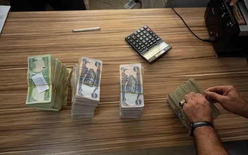 Iraqi dinar exchange rate will hit 1,450 per dollar next week: MP