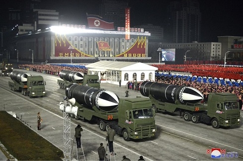 N.Korea holds huge military parade as Kim vows nuclear might