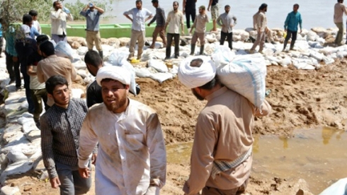 Iranians band together to battle devastating floods