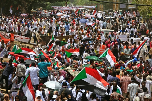 Sudan's Bashir moved to prison as protesters rally