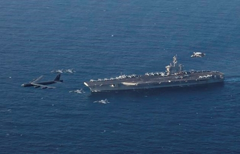 US aircraft carrier deployed over Iran remains outside Gulf