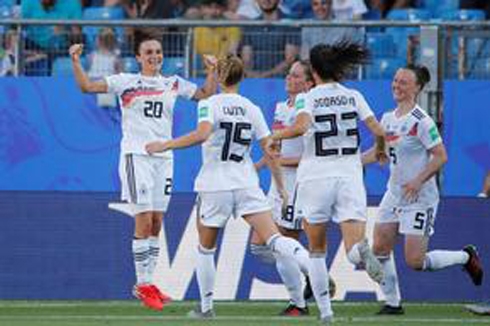 Spain and China reach last 16 as Germany thump South Africa 4-0