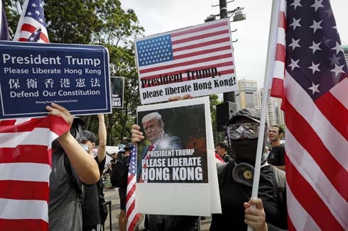 Hong Kong protesters continue past march’s end point