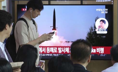 N. Korea fires missiles into sea in apparent pressure tactic