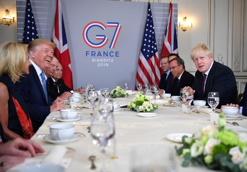 G7 leaders get to work on economy, climate change at France summit