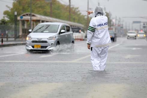 Two dead as Japan orders 870,000 to flee heavy rains