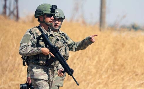 Turkish military enters Syria to begin joint U.S. 'safe zone' patrol