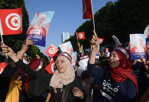 Tunisia heads to polls for tightly fought presidential contest