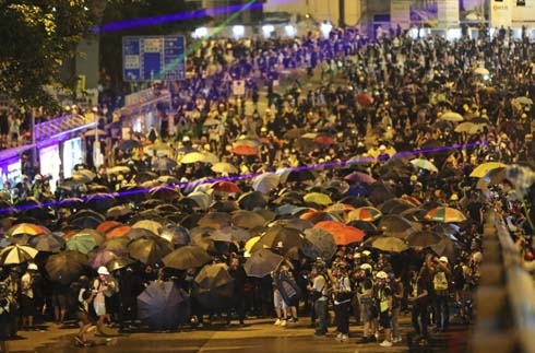 Hong Kong pro-democracy rally ends early as violence erupts