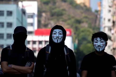 Hong Kong considers banning face masks in bid to deter protests