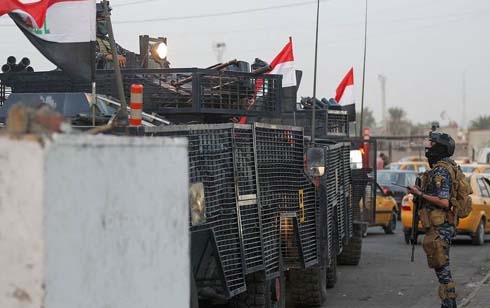 Iraq protests: 9 former officials to face corruption charges