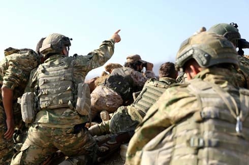 Turkey steps up assault on Syria Kurds defying sanctions threats