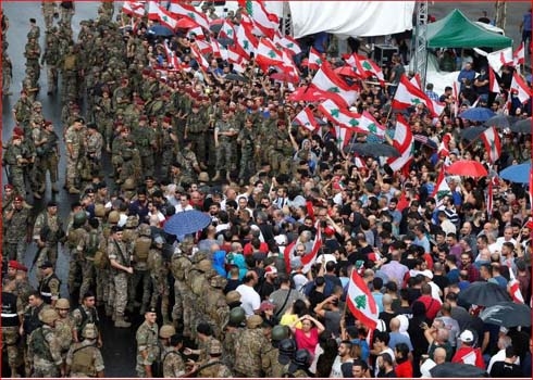 Facing protests, Lebanese leaders mull reshuffle: sources