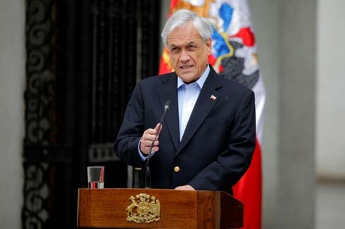 Chilean president vows major reshuffle after week of protests