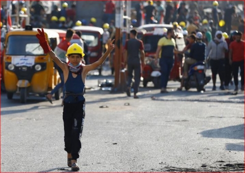 Iraqi forces shoot dead 13 protesters in renewed crackdown on unrest