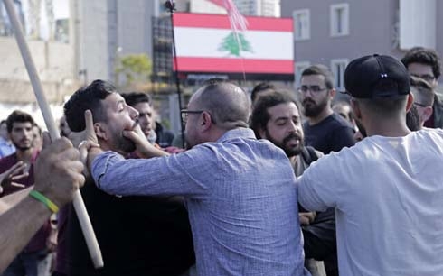 Lebanese pay tribute to first slain protester