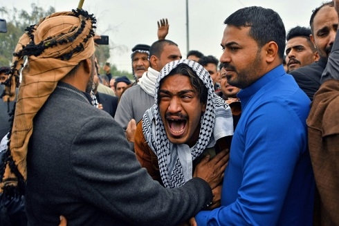 Iraq PM says will resign after bloody protests