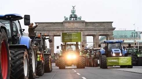 Merkel promises German farmers respect and more say after protests