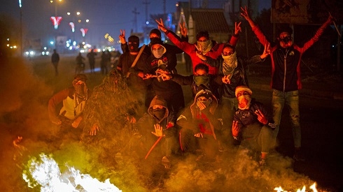 Iraqi protesters rally after night of arson attacks