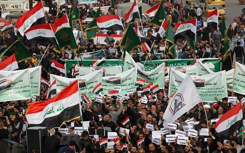 Treason or civic-minded? Iraqis split on president's threat to quit