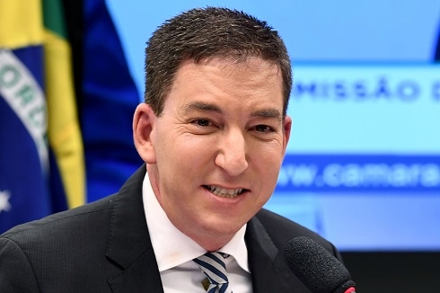 Brazil prosecutors charge Greenwald with cybercrimes