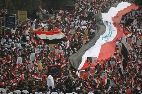 Iraqis mass to urge US troop ouster, rival rallies turn deadly