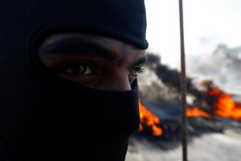 Iraq security forces clash with protesters in Baghdad and other cities