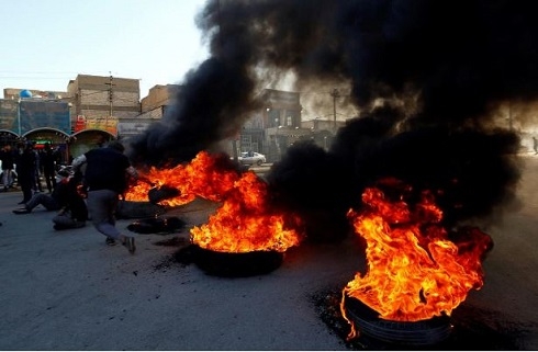 Violence escalates in Iraq as government pushes to end protests