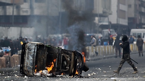 Two security members injured in grenade attack during clashes with protesters in Baghdad