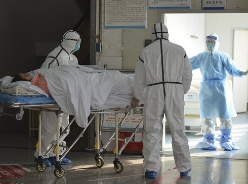 WHO says prepare for local outbreaks; China slams US control