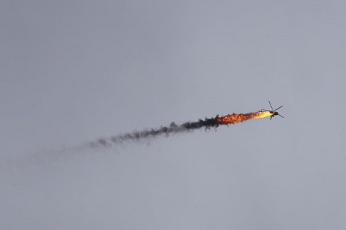 Rebels shoot down Syrian helicopter as fighting intensifies