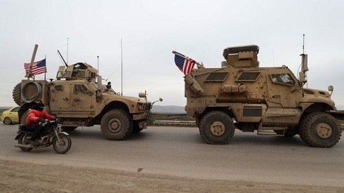 Syria war: 'One killed' as US troops clash with government loyalists near Qamishli