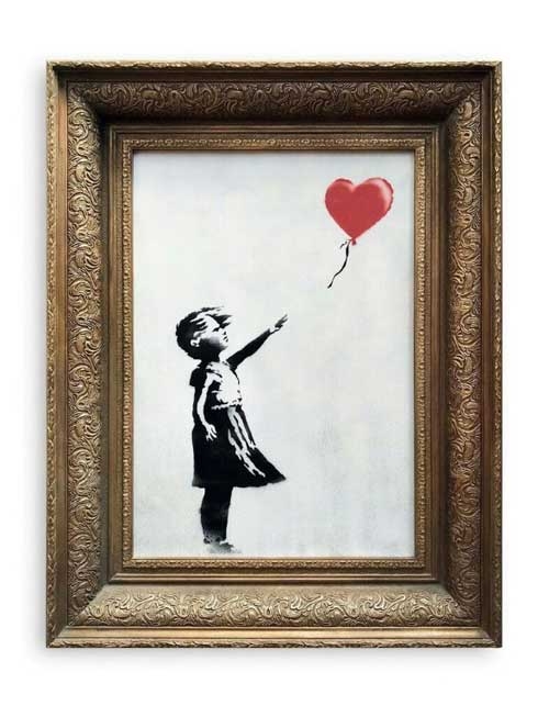 Banksy shocks art world by shredding £1 mn work at auction